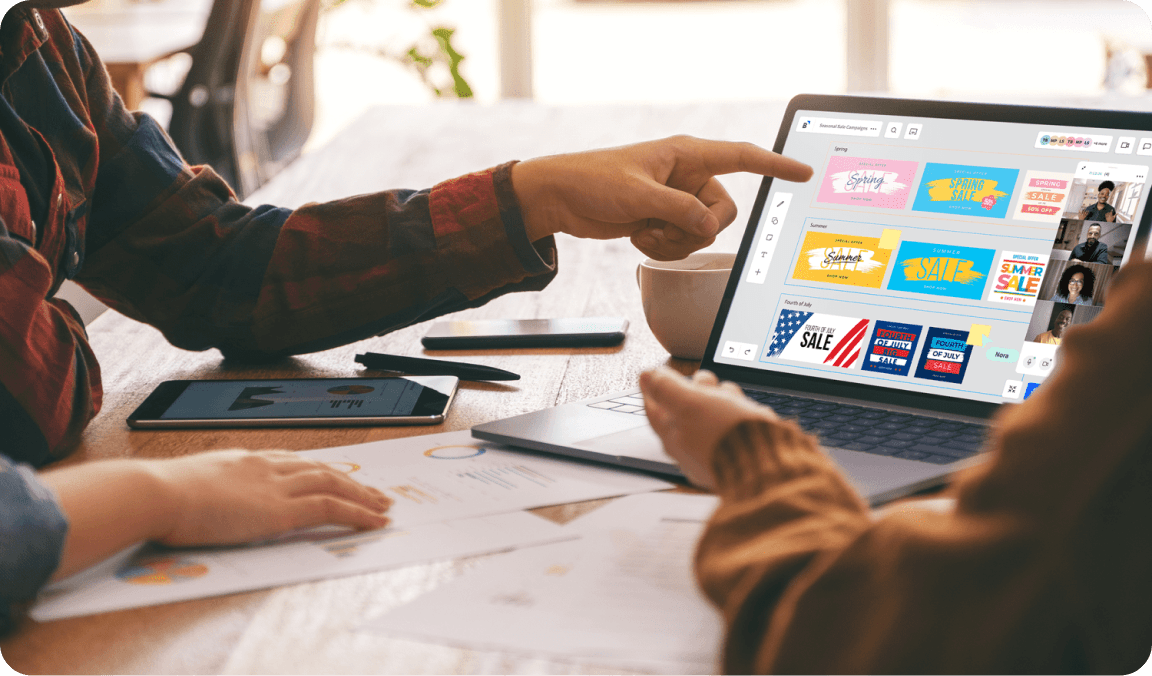 Photo - Creative - Two peolpe at desk in video meeting 02